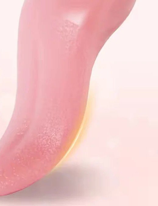 Multi-mode tongue vibrator in soft pink silicone