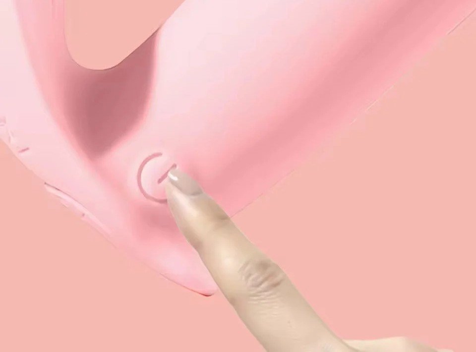 Close-up of the one-touch control button